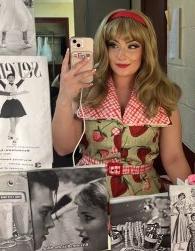Olivia Lancellotta sits in dressing room in full costume
